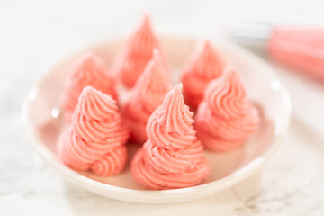 Raspberry Buttercream Swirls on Small Plate