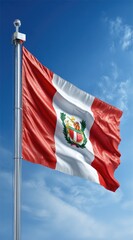 The Peruvian flag waves against a clear, bright blue sky scattered with delicate, whispy clouds, showcasing national pride and identity