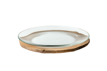 Elegant glass plate with a natural wooden base, perfect for serving delicacies or displaying desserts.