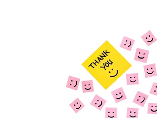 Thank you message on colorful note paper isolated on white background with smile emoji, Copy space	
