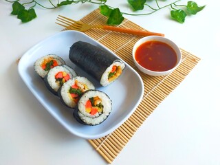 Kimbap(gimbap) made with various ingredients such as rice and eggs.