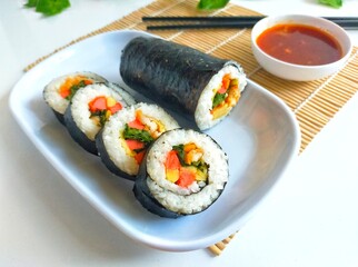 Kimbap(gimbap) made with various ingredients such as rice and eggs.