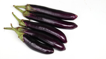 fresh raw healthy eggplants or aubergine vegetable isolated on white background. Food ingredient,...