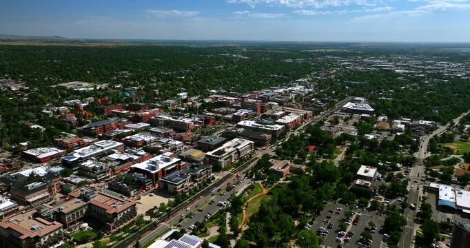 Eben G Fine Park Baseline road Boulder Creek early morning sunrise tube tubing to work day Boulder Colorado aerial drone Pearl Street Mall sunny blue sky car traffic buildings forward down motion