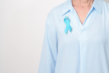 Elderly with blue Ribbon for Prostate Cancer Awareness month, April Child Abuse Prevention, National Bullying, September Addiction Recovery, May Chronic Fatigue Syndrome and January Human Trafficking