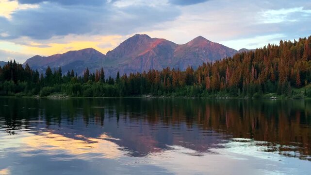 Ruby Peak Kebler Pass Lost Lake campground paddle boarding vibrant sunset golden hour spring summer aerial drone Crested Butte Colorado Three Lakes Trail Paonia Gunnison National Forest calm water