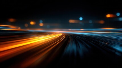 Abstract light trails of city traffic at night with bokeh effect