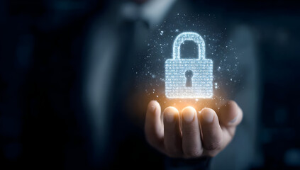 A person holds a glowing digital lock symbol, representing cybersecurity and data protection concepts in a virtual environment.