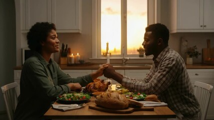 Smiling Black couple holding hands with Thanksgiving meal before sunset - Powered by Adobe