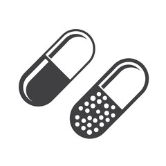 Pills of Two Dark Grey Capsules Isolated on White Background