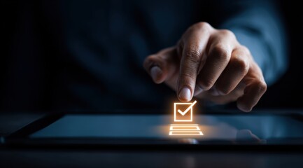 A hand placing a checkmark on a tablet