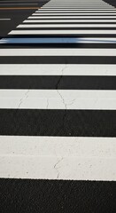 Fototapeta premium Crosswalk Pavement Lines White Black Road.