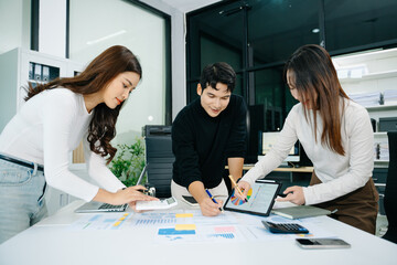  Young business creative team are brainstorming planning discussing while sitting in creative...