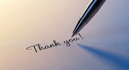 Pen writing thank you note on paper expressing gratitude and appreciation close up view of thoughtful handwritten