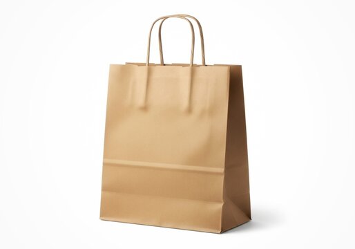 Kraft paper shopping bag isolated on white background, clean commercial stock photo.