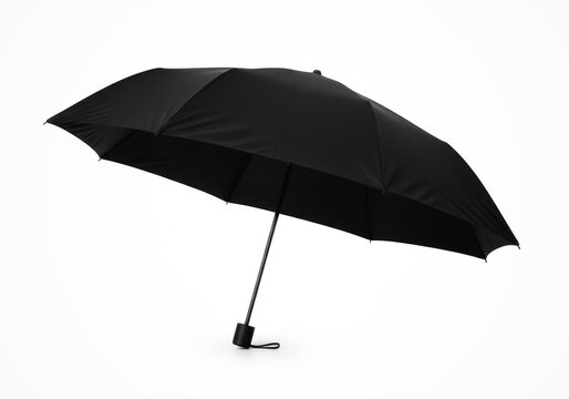 Black folding umbrella isolated on white background, clean commercial stock photo.