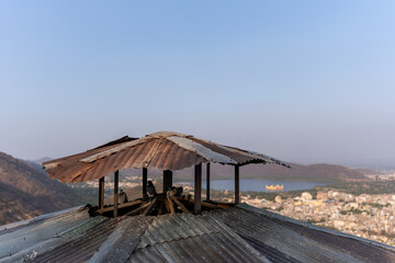 Metal Rooftop with Pigeons Overlooking Jal Mahal and Jaipur City, Rajasthan, India