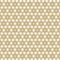 Golden floral batik pattern on a white background