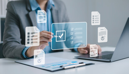 Businessman doing online survey and digital form checklist on virtual screen. Document management system, online document database, digital document icon and online document approval.