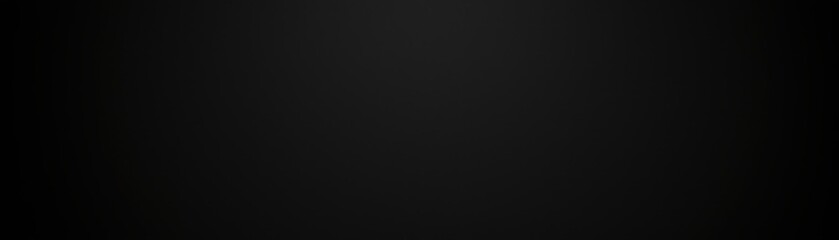 Fototapeta premium A plain black background with subtle texture creates a minimalist aesthetic.