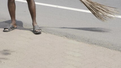 Street Sweeper in Action - Cleaning Indian Roads with a Wicker Basket