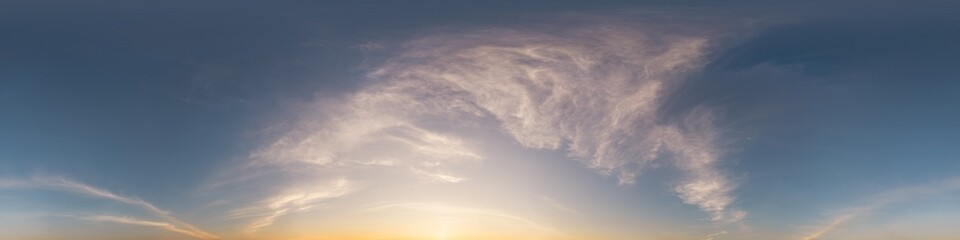360 panorama of glowing sunset sky with bright Cirrus clouds. HDR 360 seamless spherical panorama. Full zenith or sky dome sky replacement for aerial drone panoramas. Climate and weather change.