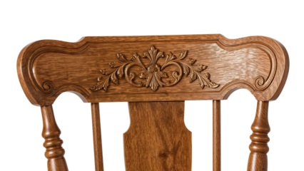 Ornate wooden chair backrest with carved floral detail and natural brown finish closeup isolated on white