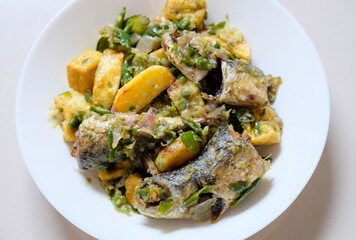 Indonesian homemade food, fried fish with green chili or sambal ijo