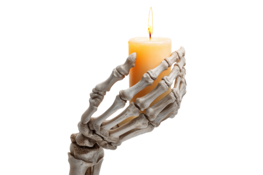 A Halloween skeleton hand holding a burning candle, isolated on a transparent background.