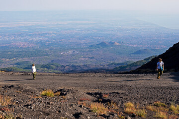 family hikes to the craters of the volcano Etna early in the morning. Active school holidays