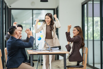 Asian business group delighted with success in their careers	