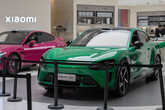 Shanghai, China - July 18, 2025: Xiaomi YU7 Max, an electric mid-size luxury crossover SUV developed by Xiaomi Auto, is seen on display next to the SU7 at a Xiaomi store in Shanghai, China.