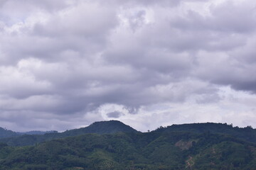 Khlong Din Daeng Reservoir Nakhon Si Thammarat, Landscape with rock, Stone yard in the grassland with mountain view
