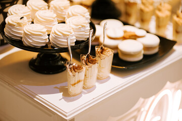 Delightful dessert display featuring whipped cream treats at an elegant event