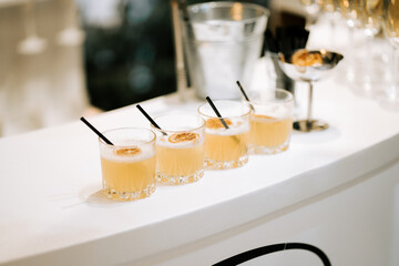 Refreshing cocktails served at a modern bar during an evening gathering