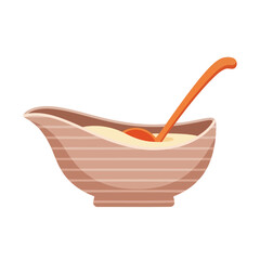 Ceramic gravy boat filled with savory brown gravy and a ladle for a traditional Thanksgiving holiday feast.