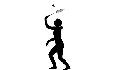 Silhouette of a woman playing badminton, serving the shuttlecock.