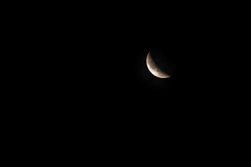 The moon begins to brighten again after the total eclipse of September 7, 2025, as seen from Pisa, Italy