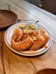 a dish of grilled shrimp