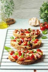 Freshly made bruschetta sandwiches - traditional dish of Italian cuisine	