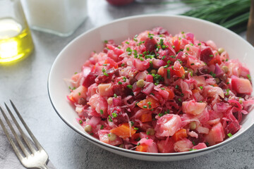 A bowl with Vinegret salad, a typical Russian dish