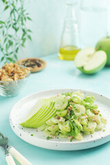 A plate with Waldorf salad, traditional American