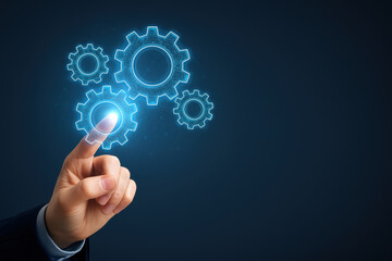 Futuristic technology digital innovation business concept with hand touching glowing virtual gears symbolizing progress automation and modern solutions on dark background