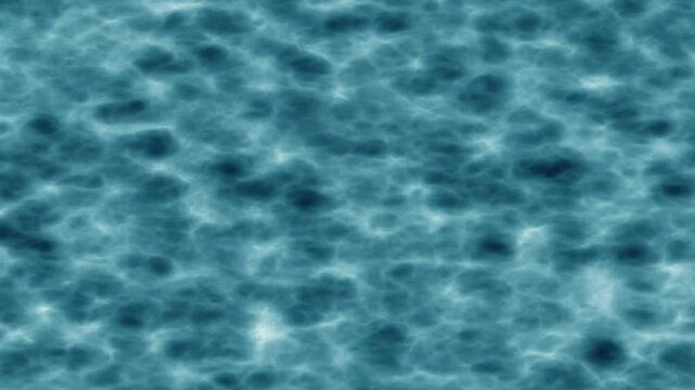 A computer-generated shot of a realistic water surface texture, showing blue rippling waves with light and shadow variations. The effect looks like underwater light caustics or a pool/ocean surface,