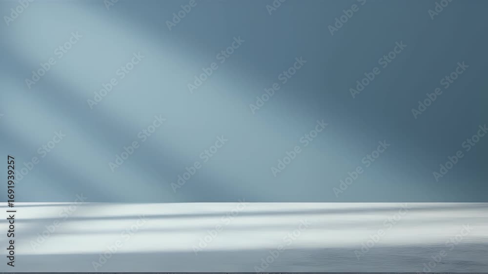 Poster minimalist blue wall and white table background with diagonal window shadows for product display.