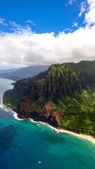 Aerial view of dramatic coastal mountains and turquoise ocean