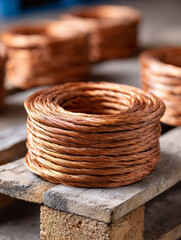 Obraz premium Coiled copper wire for industrial and construction purposes.