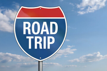 Interstate highway sign with white text R O A D T R I P against blue sky road trip travel