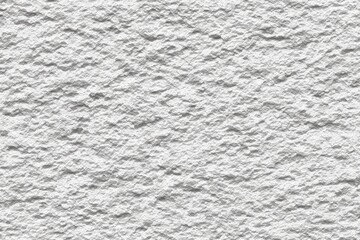 Textured white surface with rough, uneven, granular pattern