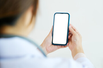Female hand holding mobile phone with blank screen, Smartphone mockup isolated white screen, business and technology